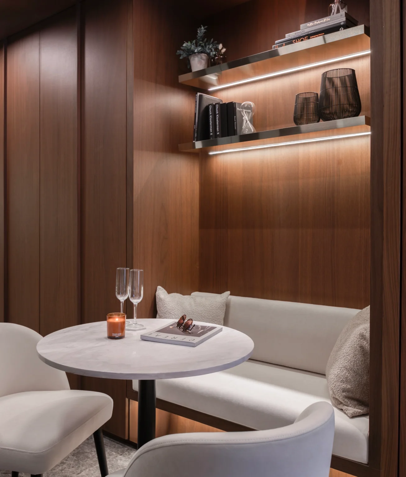CloutHaus residence interior with warm bronze and timber details